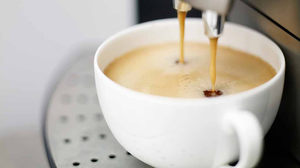 espresso-pouring-from-coffee-machine